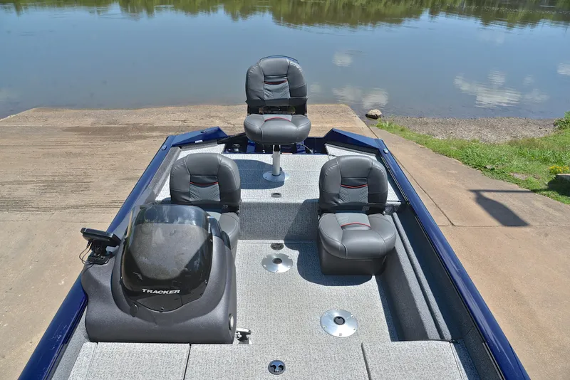 Slide: The Image of 2021 Bass Tracker PRO TEAM 175 TF fishing boat at a boat ramp. - 21