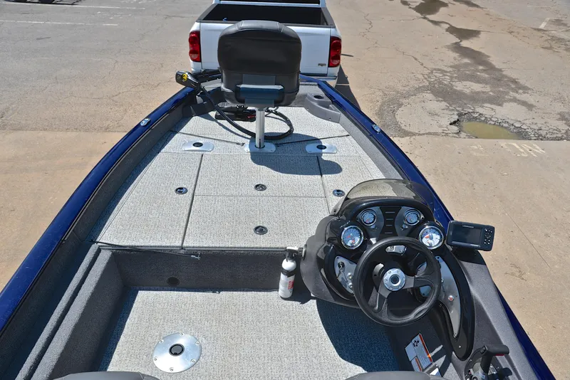 Slide: The Image of 2021 Bass Tracker PRO TEAM 175 TF fishing boat interior with steering console and seating. - 22