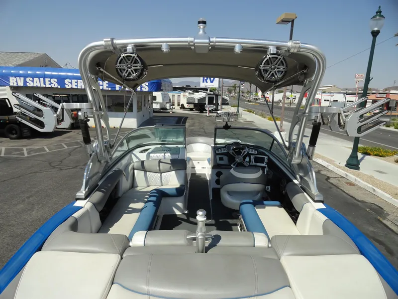 Slide: The Image of 2013 MasterCraft X-10 boat interior with tower speakers and seating. - 6