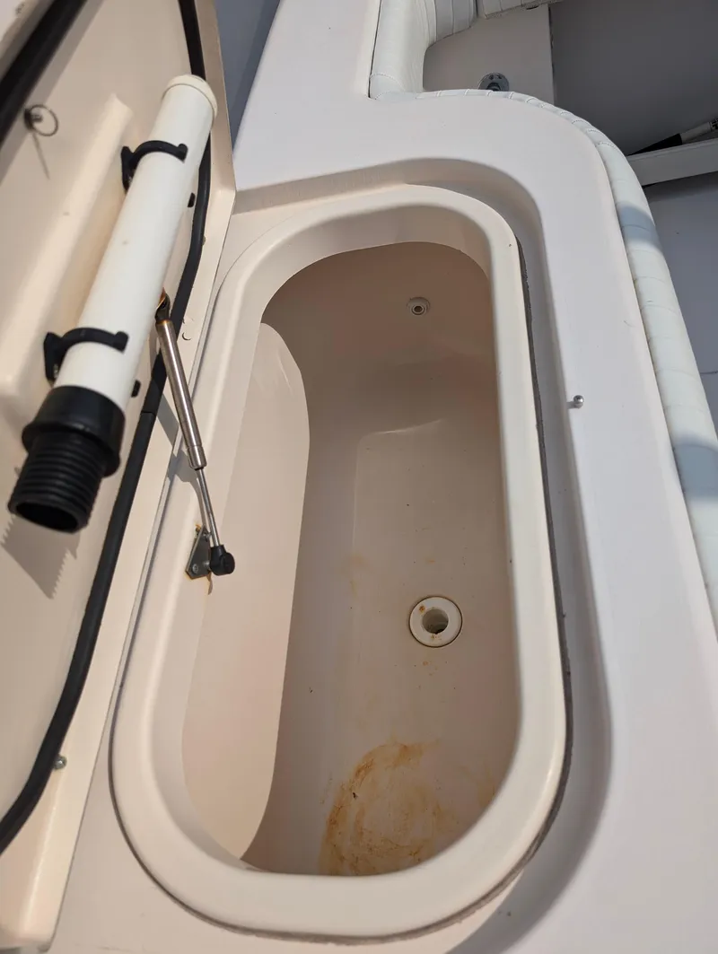 Slide: The Image of Livewell compartment on a 2000 Grady-White Bimini 306 boat. - 14