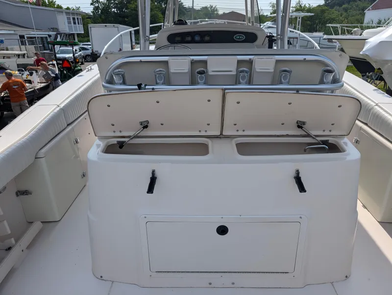 Slide: The Image of 2000 Grady-White Bimini 306 boat interior with open storage compartments. - 16