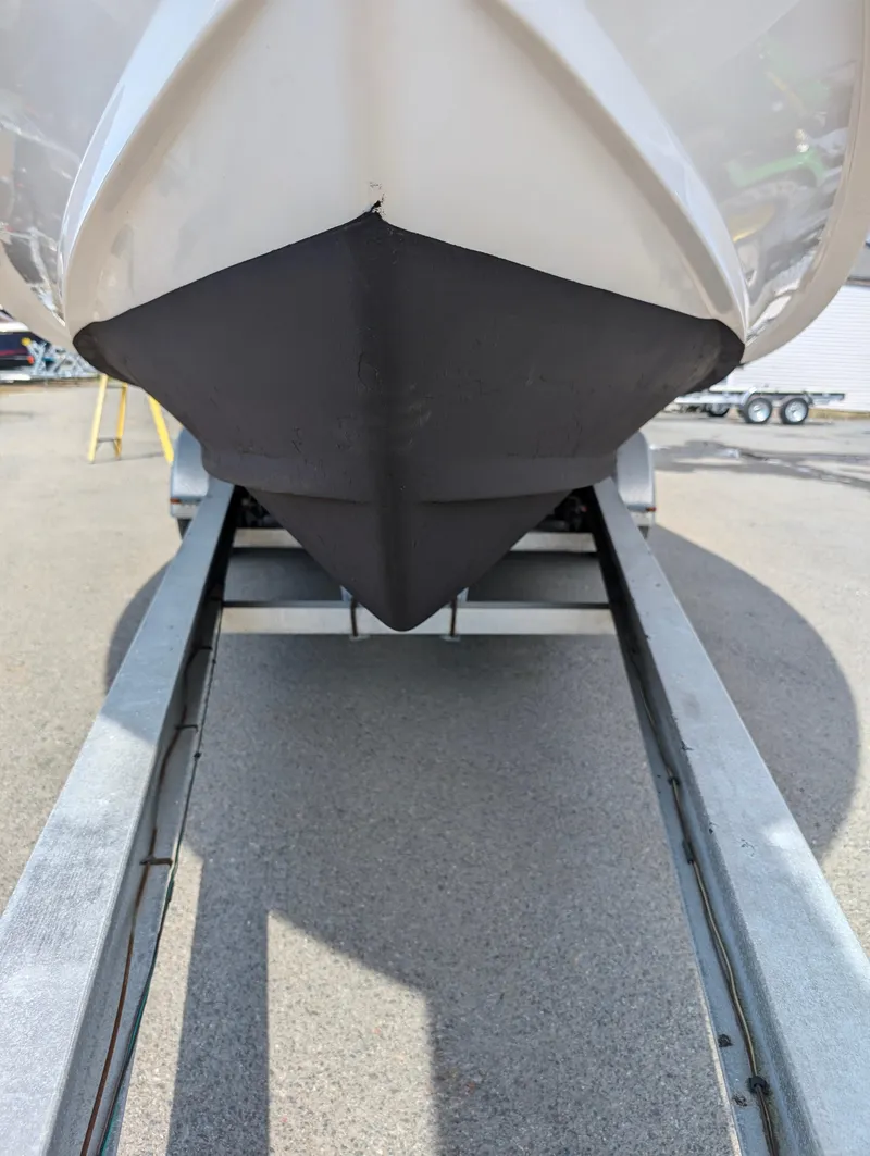 Slide: The Image of 2000 Grady-White Bimini 306 boat on trailer, close-up of hull. - 30