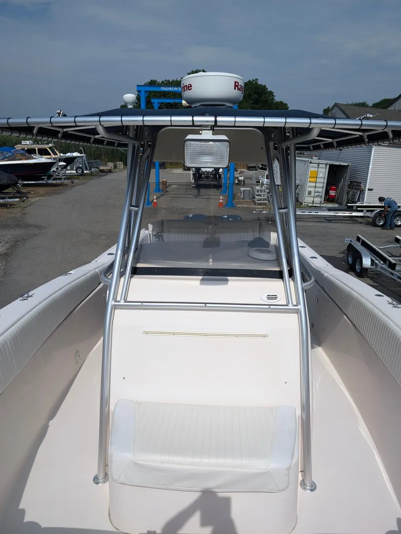 Slide: The Image of 2000 Grady-White Bimini 306 boat with T-top and radar. - 5
