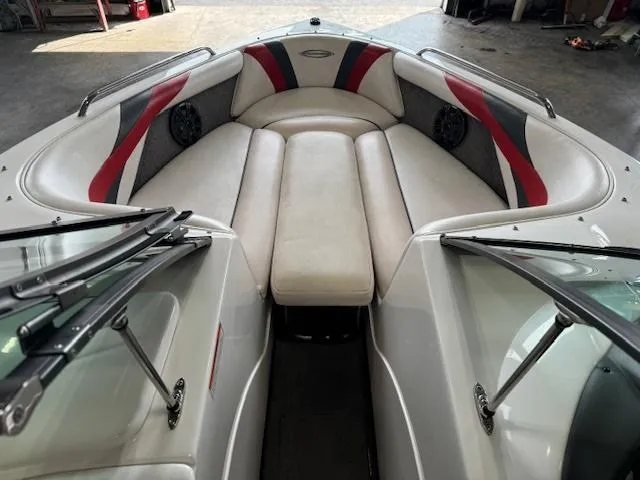 Slide: The Image of 2007 Moomba Mobius LSV boat interior with cushioned seating and speakers. - 3