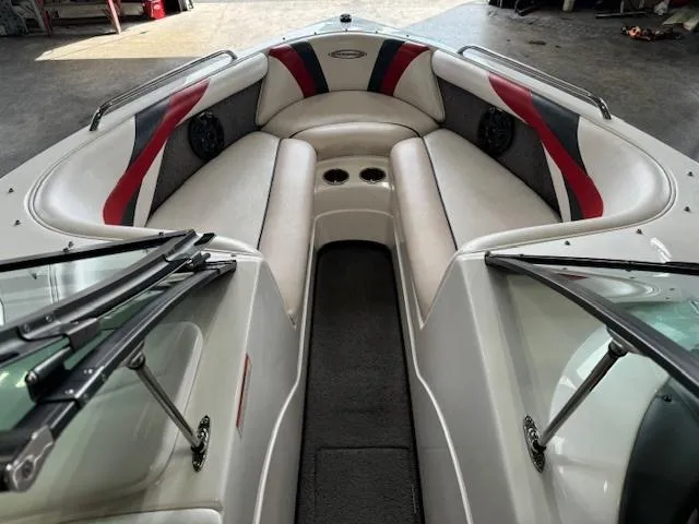 Slide: The Image of 2007 Moomba Mobius LSV boat interior with white and red seating. - 4