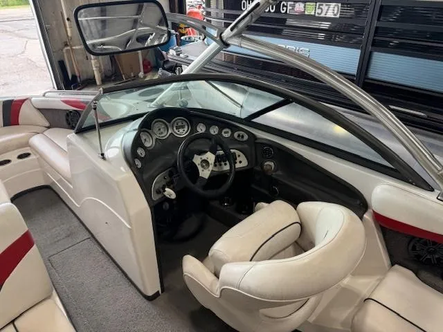 Slide: The Image of 2007 Moomba Mobius LSV boat interior with steering wheel and dashboard. - 6