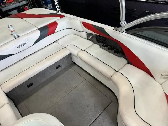 Slide: The Image of 2007 Moomba Mobius LSV boat interior with white and red seating. - 7
