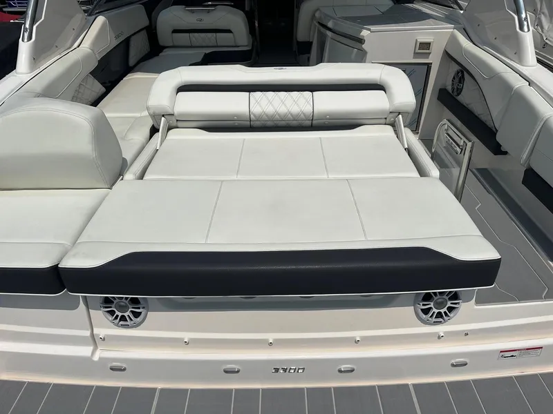 Slide: The Image of 2025 Regal 3300 boat with luxurious white seating and modern design. - 8
