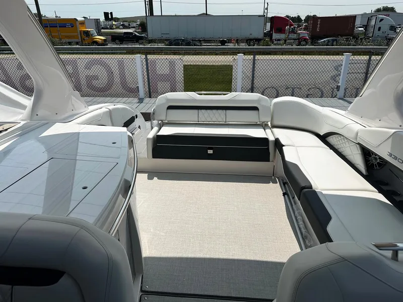 Slide: The Image of 2025 Regal 3300 boat interior with white seating and modern design. - 4