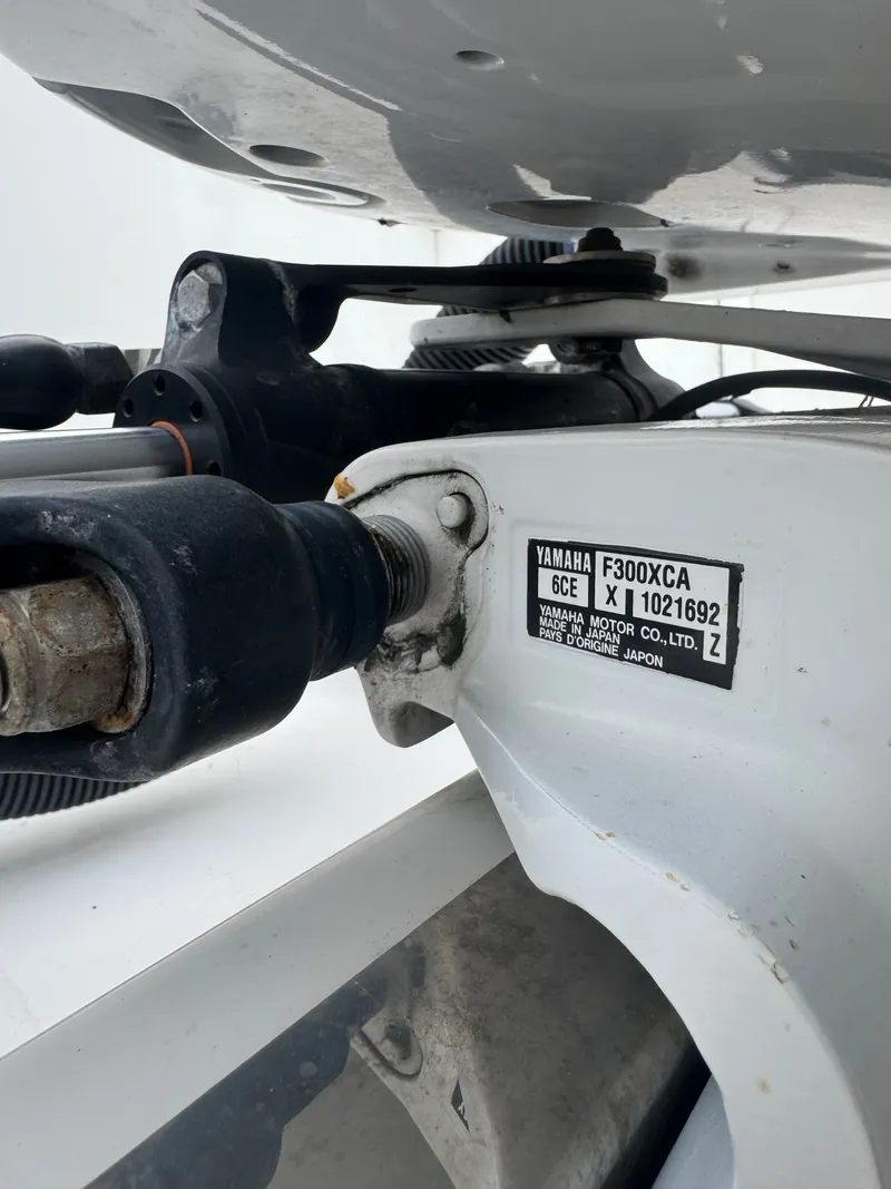 Slide: The Image of Close-up of a Yamaha F300XCA outboard motor on a Southport 33 boat. - 13