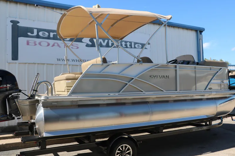 Slide: The Image of 2025 Sylvan Mirage 820 CLZ DH pontoon boat with canopy on trailer. - 1