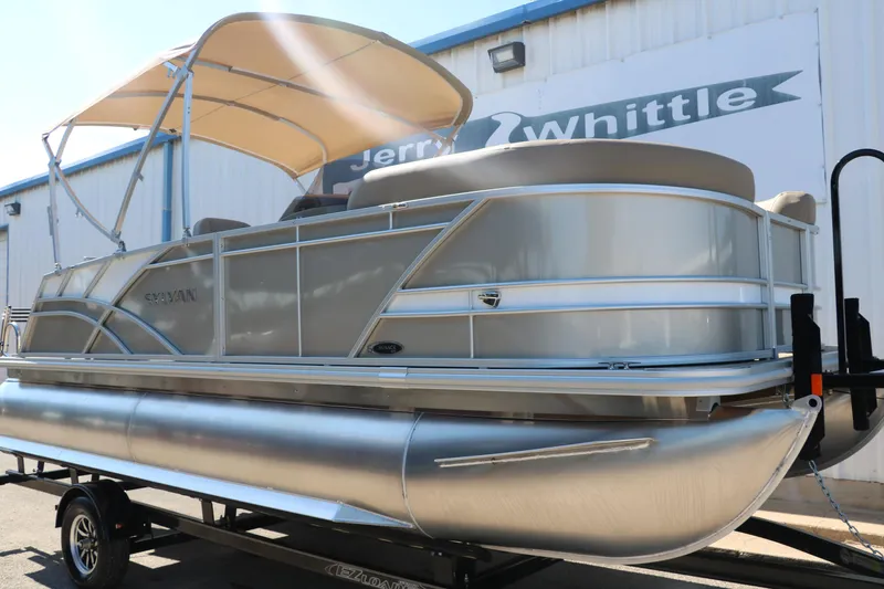 Slide: The Image of 2025 Sylvan Mirage 820 CLZ DH pontoon boat on trailer with canopy. - 11