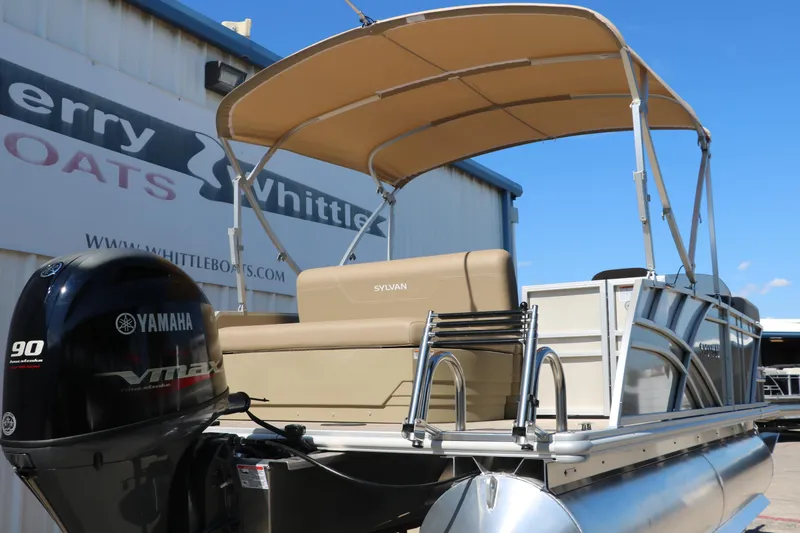 Slide: The Image of 2025 Sylvan Mirage 820 CLZ DH pontoon boat with Yamaha 90 engine at dealership. - 2