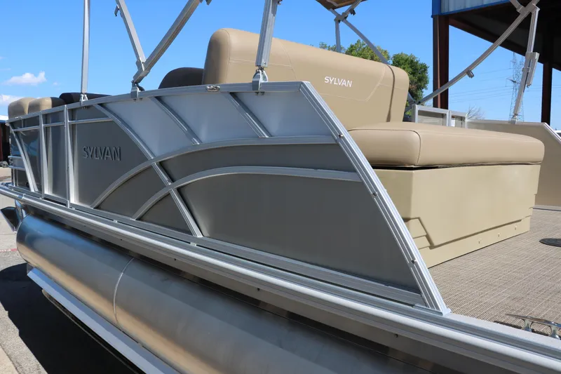 Slide: The Image of 2025 Sylvan Mirage 820 CLZ DH pontoon boat with beige seating. - 6