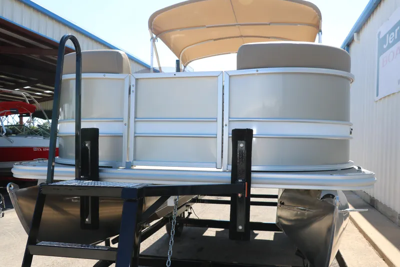 Slide: The Image of 2025 Sylvan Mirage 820 CLZ DH pontoon boat on trailer, rear view. - 9