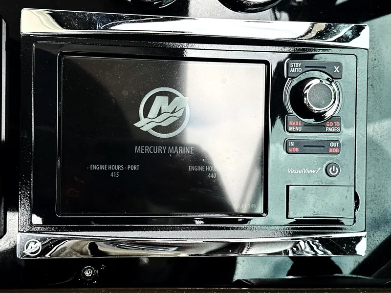 Slide: The Image of Mercury Marine VesselView display on 2015 Formula 310 Sun Sport boat. - 24