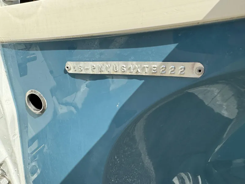 Slide: The Image of 2022 Stingray 206 CC trailer with dual black alloy wheels and diamond plate fender. - 24