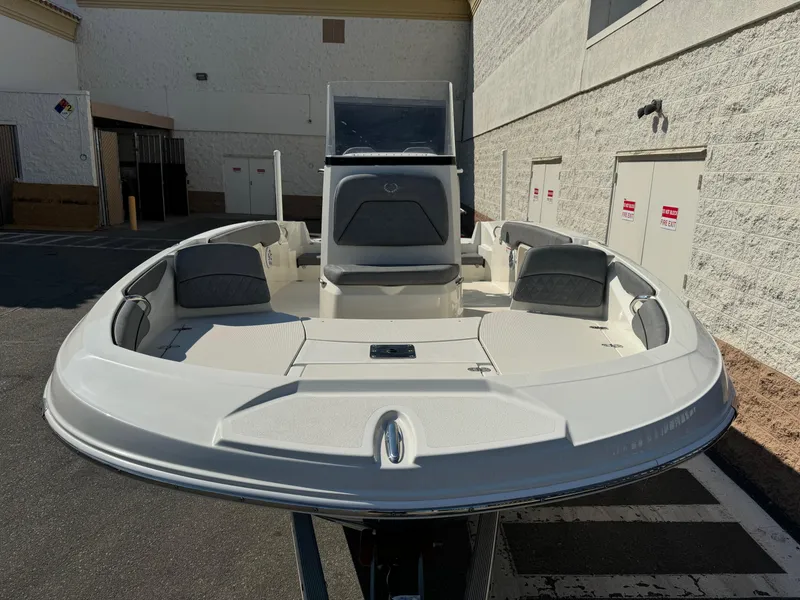 Slide: The Image of 2022 Stingray 206 CC boat with Suzuki outboard motor on trailer. - 4