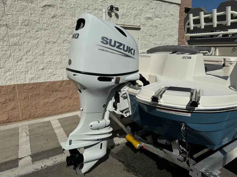 Slide: The Image of 2022 Stingray 206 CC boat bow seating and storage compartments. - 8