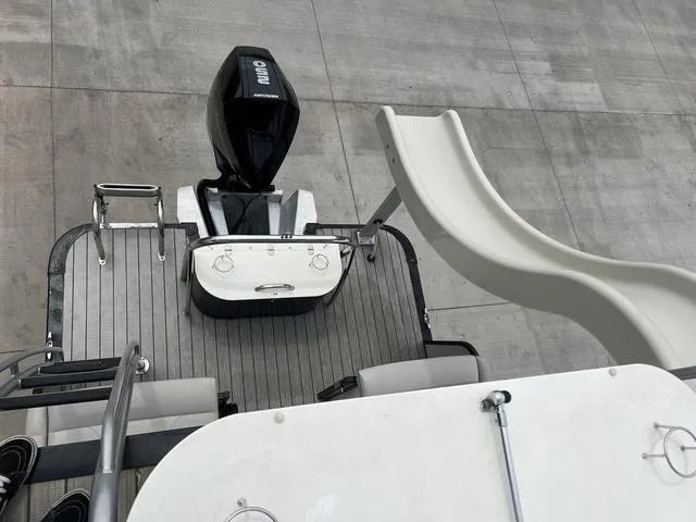 Slide: The Image of 2018 Avalon Catalina Funship 27' with slide and outboard motor. - 15