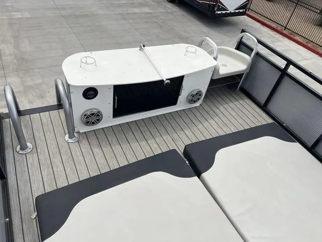 Slide: The Image of 2018 Avalon Catalina Funship 27' deck with seating and storage. - 16