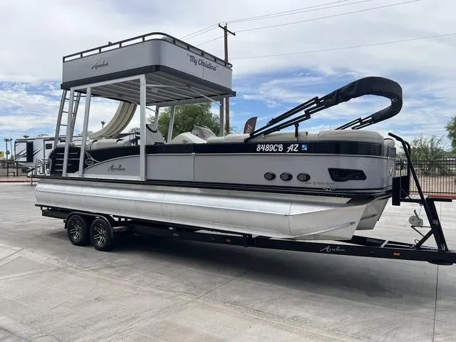 Slide: The Image of 2018 Avalon Catalina Funship 27' pontoon boat on a trailer. - 3