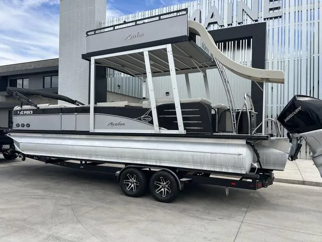 Slide: The Image of 2018 Avalon Catalina Funship 27' pontoon boat with Mercury outboard motor. - 5