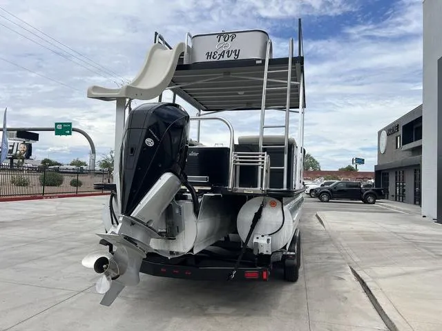 Slide: The Image of 2018 Avalon Catalina Funship 27' pontoon boat with slide and outboard motor. - 8