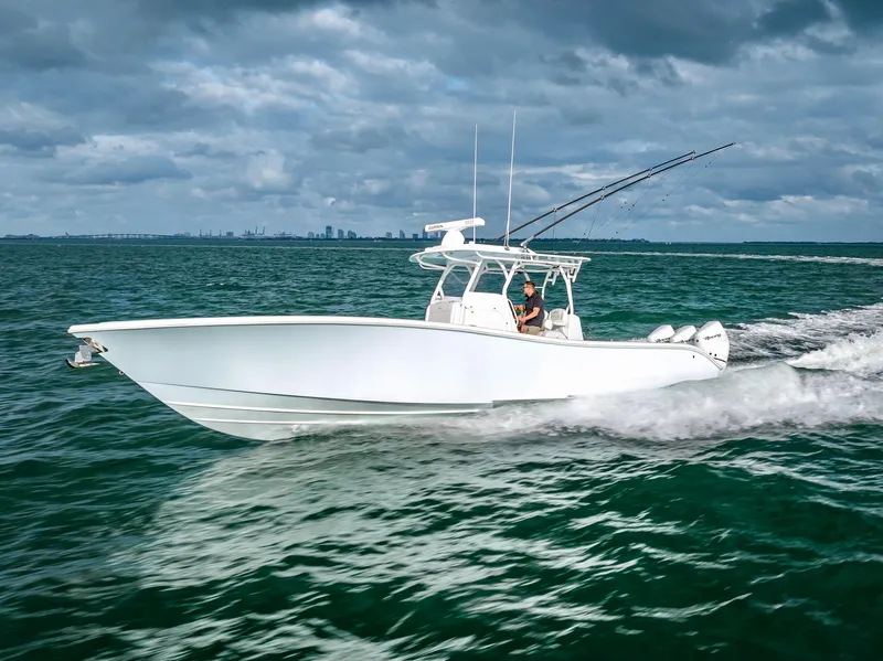 Slide: The Image of 2023 Yellowfin 36 boat cruising on open water. - 2