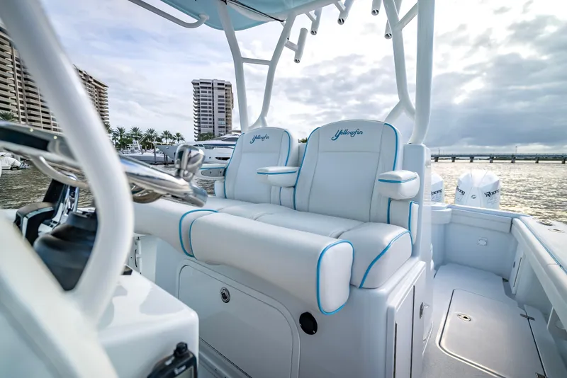 Slide: The Image of 2023 Yellowfin 36 boat interior with luxurious seating and waterfront view. - 30