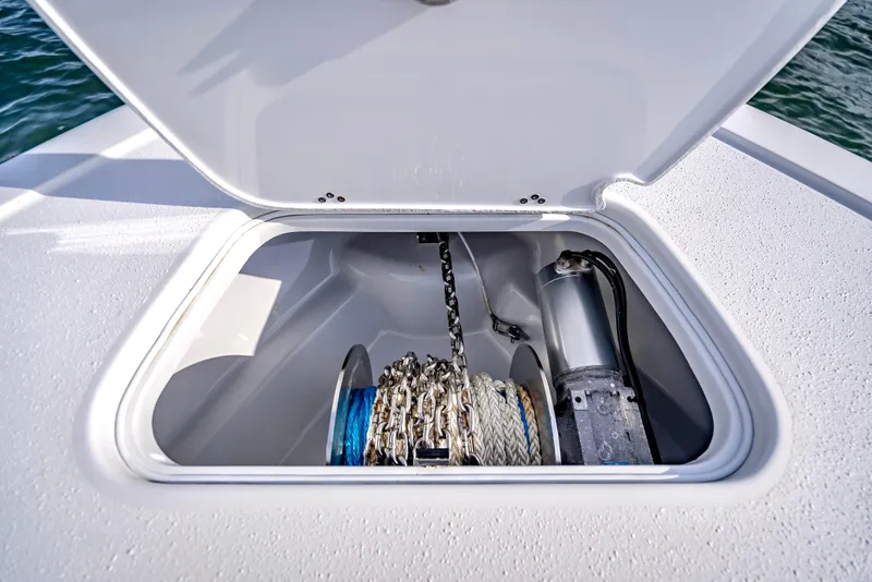 Slide: The Image of Anchor storage compartment on a 2023 Yellowfin 36 boat. - 48