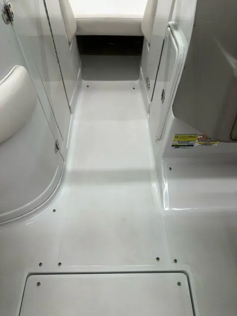 Slide: The Image of Interior walkway of a 2011 Crownline BOWRIDER 245 SS boat. - 14