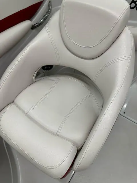Slide: The Image of 2011 Crownline BOWRIDER 245 SS white leather boat seat. - 5