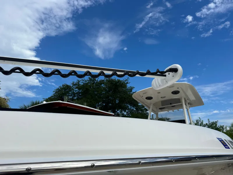 Slide: The Image of 2023 Blackwood 27HD boat against a clear blue sky. - 12