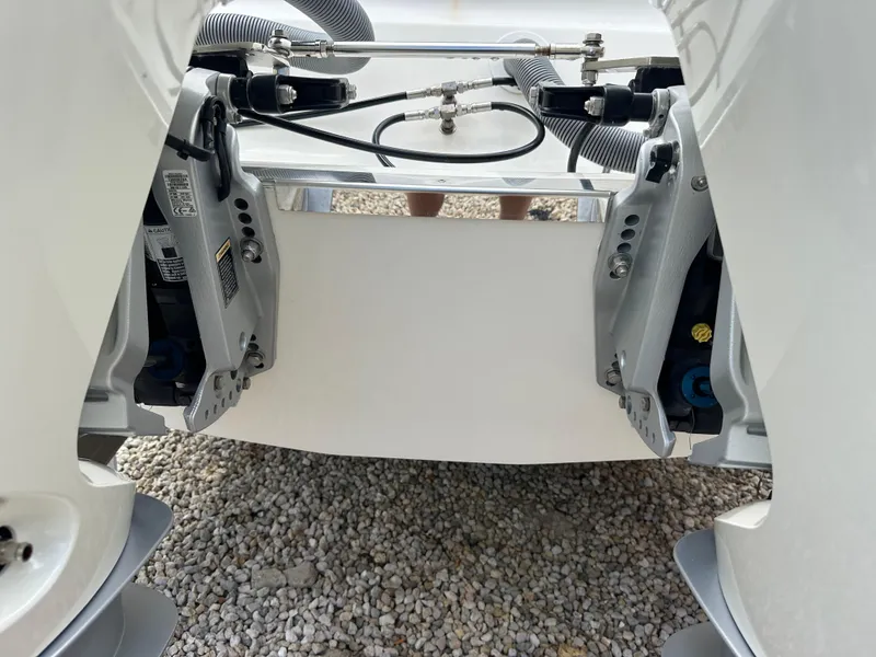 Slide: The Image of 2023 Blackwood 27HD boat engine components on gravel surface. - 16