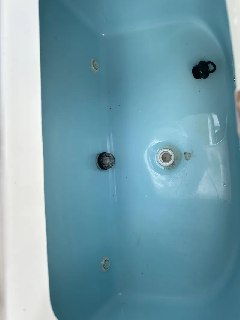 Slide: The Image of Blue bathtub interior, Blackwood 27HD model, 2023 design, with drain and faucet fixtures. - 22