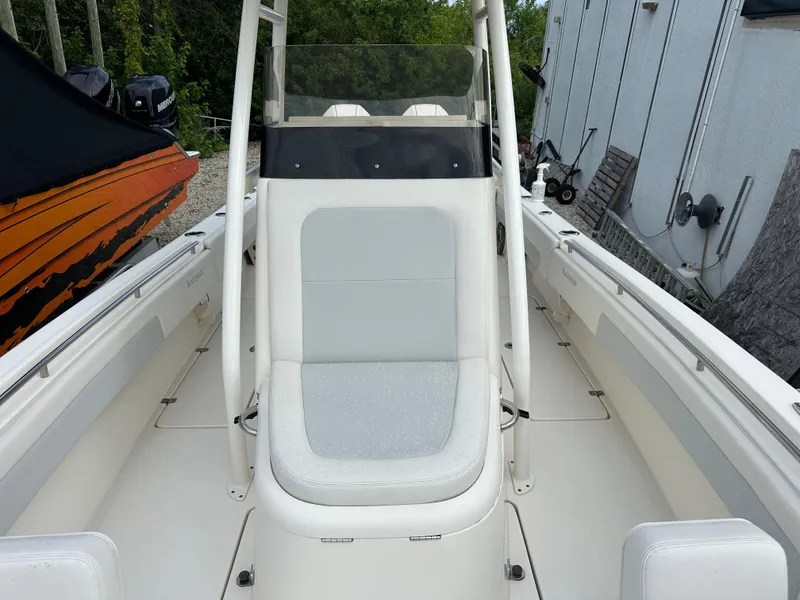 Slide: The Image of 2023 Blackwood 27HD boat interior with white seating and console. - 26