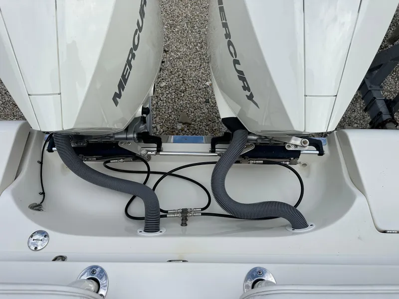 Slide: The Image of Twin Mercury outboard engines on a 2023 Blackwood 27HD boat. - 45