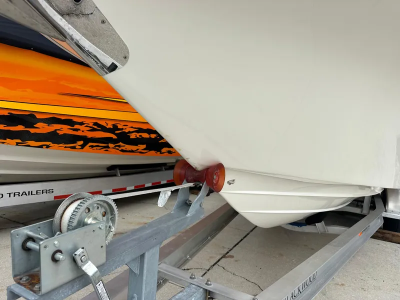 Slide: The Image of 2023 Blackwood 27HD boat on trailer, close-up of hull and winch system. - 9