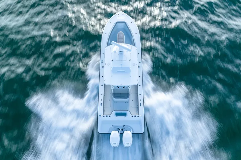 Slide: The Image of Aerial view of 2025 Yellowfin 32 boat cruising on open water. - 14