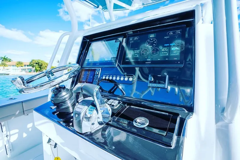 Slide: The Image of Control panel of 2025 Yellowfin 32 boat with advanced navigation systems. - 20