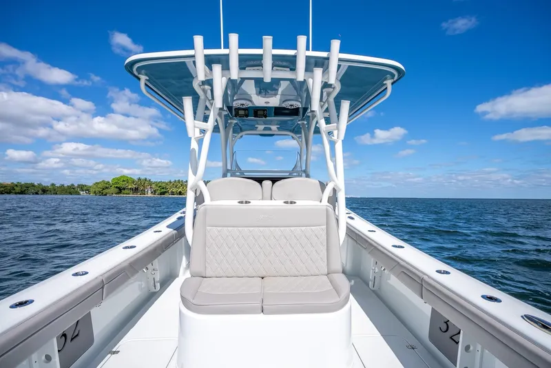 Slide: The Image of 2025 Yellowfin 32 boat on open water with blue sky background. - 28