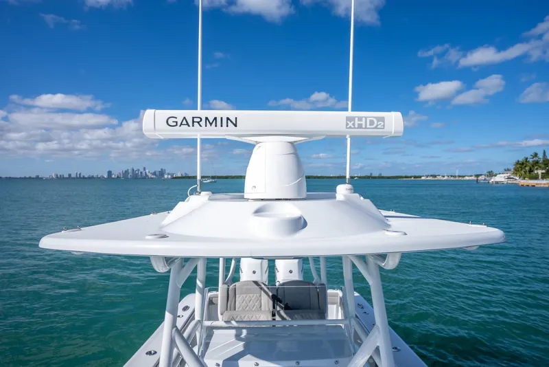 Slide: The Image of 2025 Yellowfin 32 boat with Garmin xHD2 radar on open water. - 39