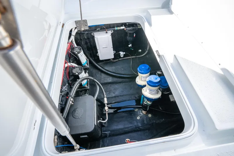 Slide: The Image of 2025 Yellowfin 32 boat engine compartment with wiring and components - 45
