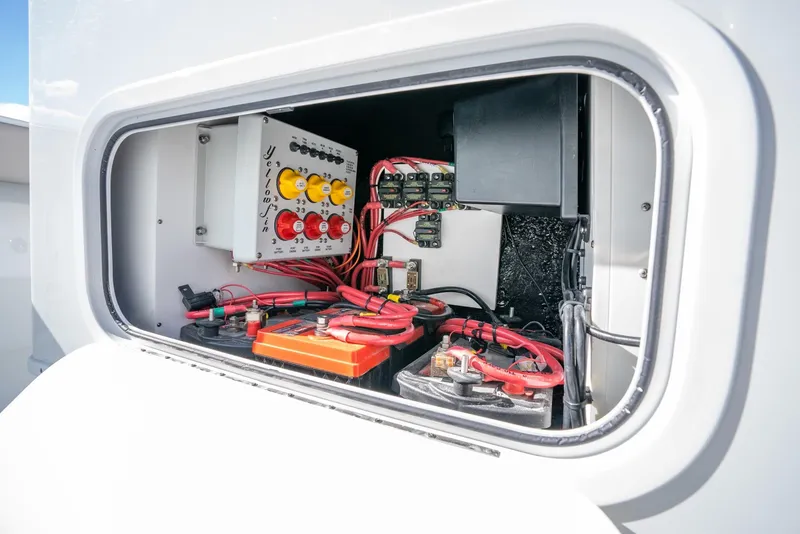 Slide: The Image of Electrical system compartment of a 2025 Yellowfin 32 boat. - 46