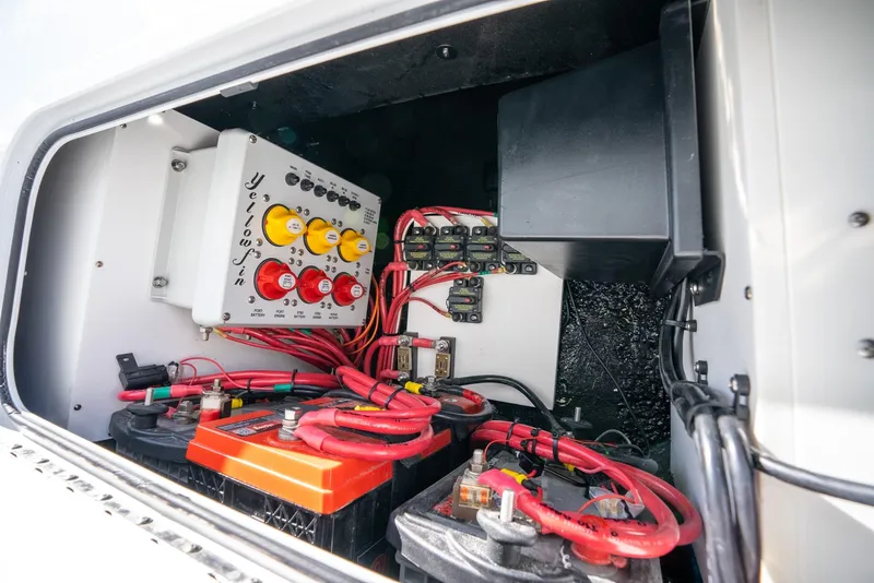 Slide: The Image of Electrical system of a 2025 Yellowfin 32 boat with batteries and wiring. - 47