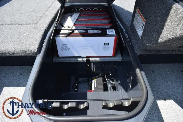 Slide: The Image of Storage compartment of 2025 Lund 1675 Adventure SS boat with Thayer's Marine logo. - 18