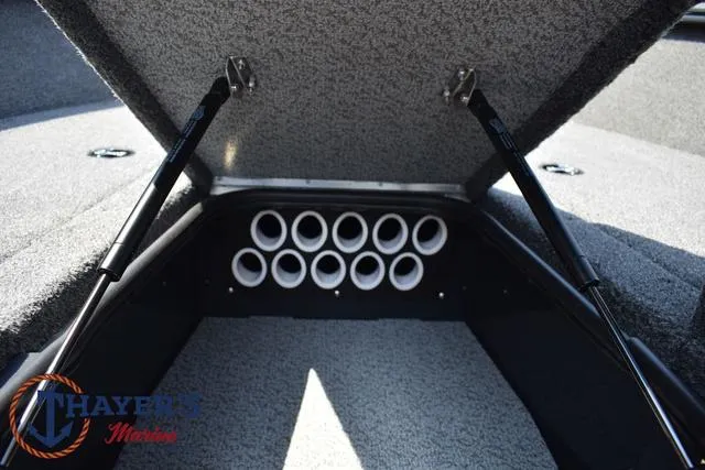 Slide: The Image of 2025 Lund 1675 Adventure SS boat storage compartment with rod holders. - 19