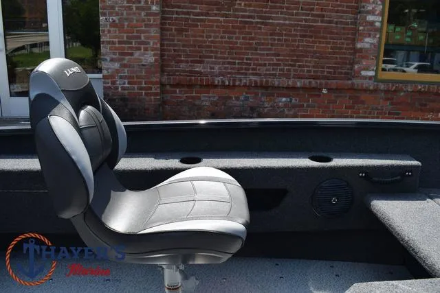Slide: The Image of 2025 Lund 1675 Adventure SS boat seat with Thayer's Marine logo. - 22