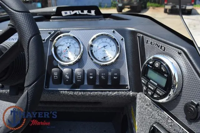 Slide: The Image of Dashboard of 2025 Lund 1675 Adventure SS boat with gauges and controls. - 28